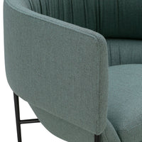 Teal green upholstered chair with textured fabric and sleek black metal legs, featuring a modern design.