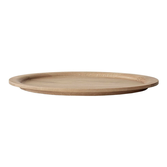 Natural wood round serving plate with a smooth, light brown finish and subtle grain patterns. Ideal for dining.