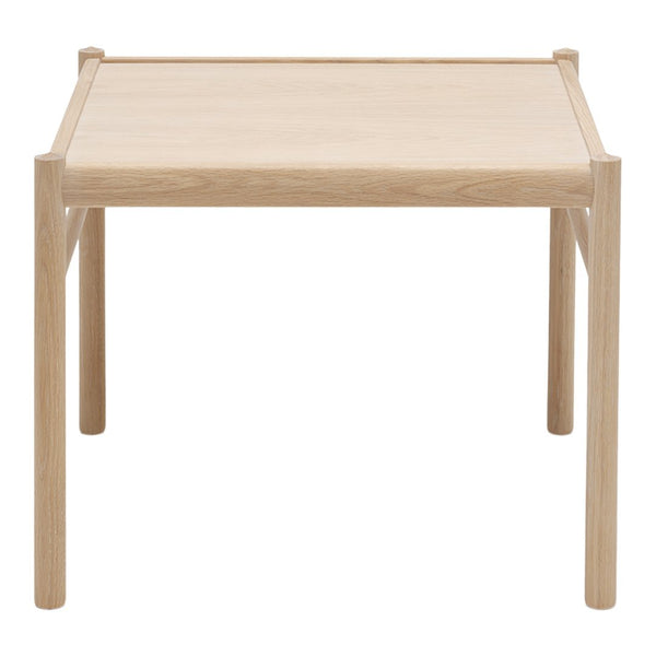 Light oak wood table with a smooth, natural finish and minimalistic design. Perfect for modern interiors.