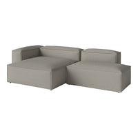 Gray sectional sofa with a minimalist design and smooth fabric, featuring a solid color pattern.