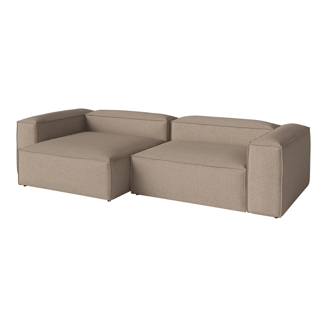 Beige sectional sofa with a smooth, solid fabric finish and modern, minimalist design. Perfect for contemporary living spaces.
