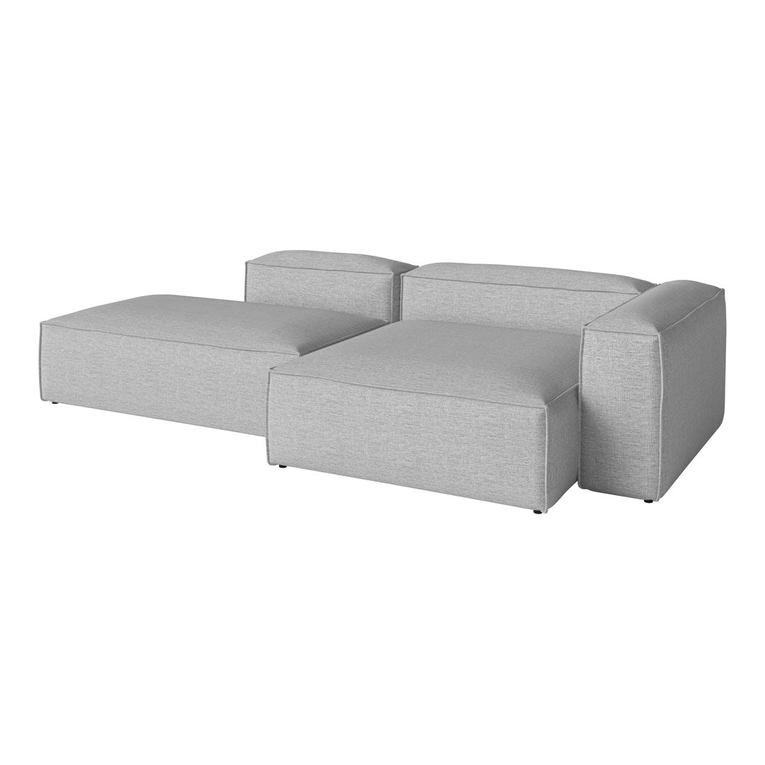 Gray sectional sofa with a smooth fabric texture and modern, minimalist design. Perfect for contemporary decor.