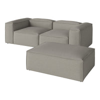 Light gray modular sofa with clean lines and a minimalist design, featuring soft textured fabric in a solid color.