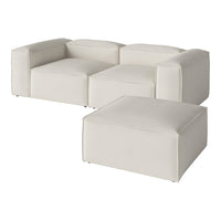 Modern white sectional sofa with clean lines and a matching ottoman, featuring a sleek and minimalist design.