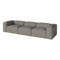 Modern gray sectional sofa with a sleek, minimalist design and smooth, seamless upholstery.