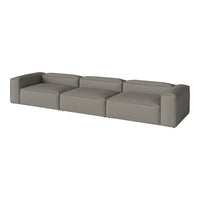Modern gray sectional sofa with a sleek, minimalist design and solid color upholstery. Perfect for any living space.