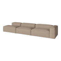 Beige modular sofa with smooth, solid fabric design; minimalistic and modern style for versatile decor.