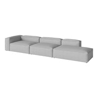 Gray modular sofa with a smooth texture and contemporary design, featuring clean lines and a minimalist aesthetic.