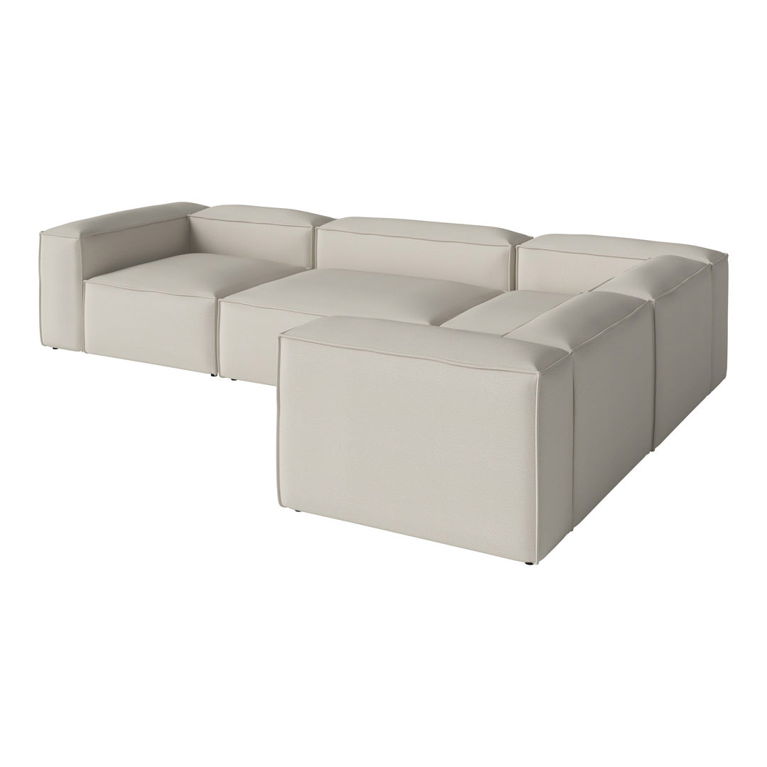 Light beige modular sectional sofa with a sleek, minimalist design and smooth, clean lines. Perfect for modern decor.