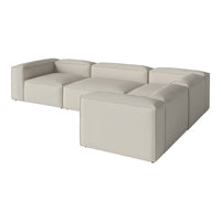 Light beige modular sectional sofa with a sleek, minimalist design and smooth, clean lines. Perfect for modern decor.