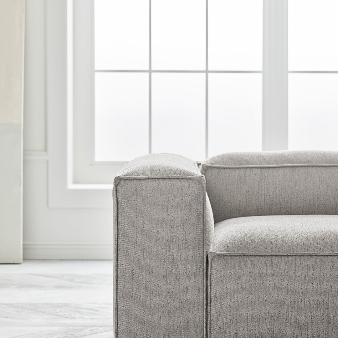 Light gray, textured fabric with a smooth, modern pattern, showcasing a clean, minimalist design.