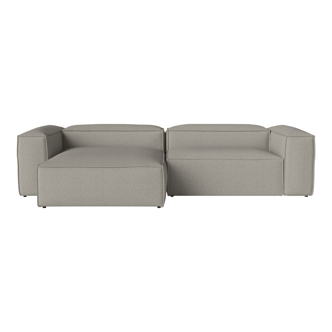 Stylish two-tone gray sectional sofa with a modern, minimalist design and textured upholstery.