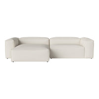 Modern L-shaped sofa in neutral white upholstery with clean lines and minimalistic design.