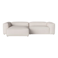Modern white sectional sofa with clean lines and a minimalist design, perfect for contemporary living spaces.