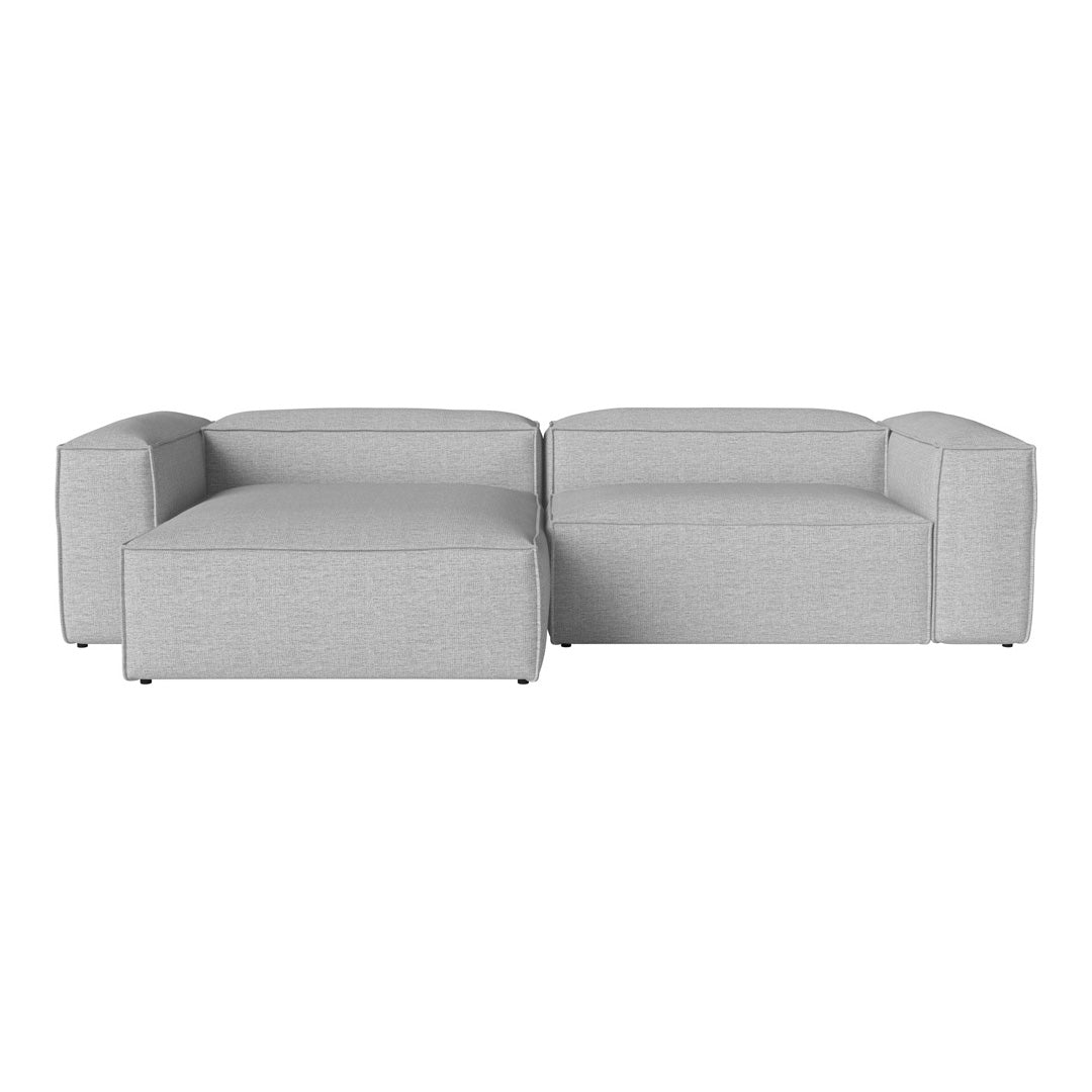 Light gray modular sofa with a smooth texture and minimalist design, featuring straight lines and no patterns.