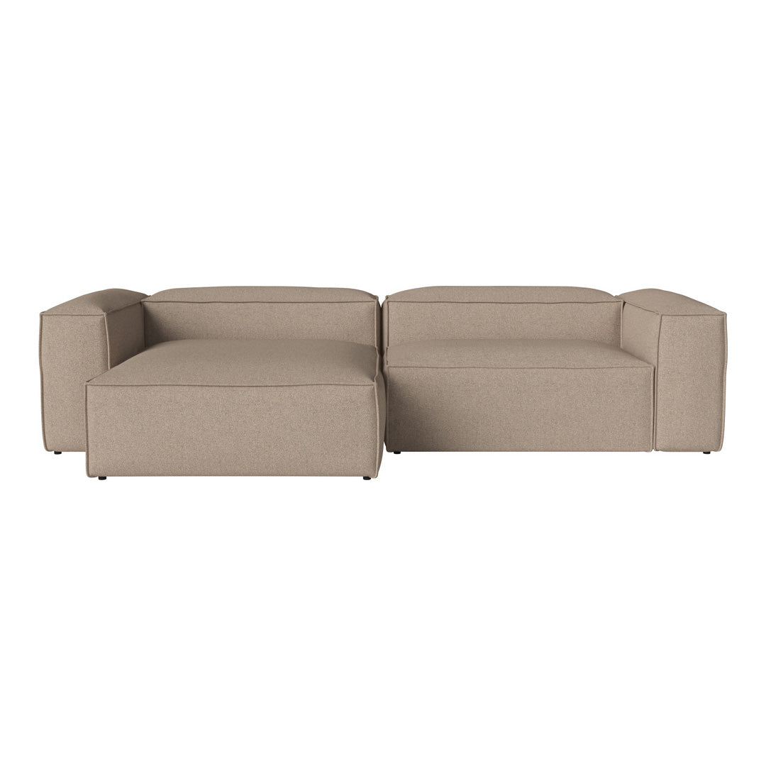 Beige modular sectional sofa with a clean, contemporary design and smooth texture. Ideal for modern living spaces.