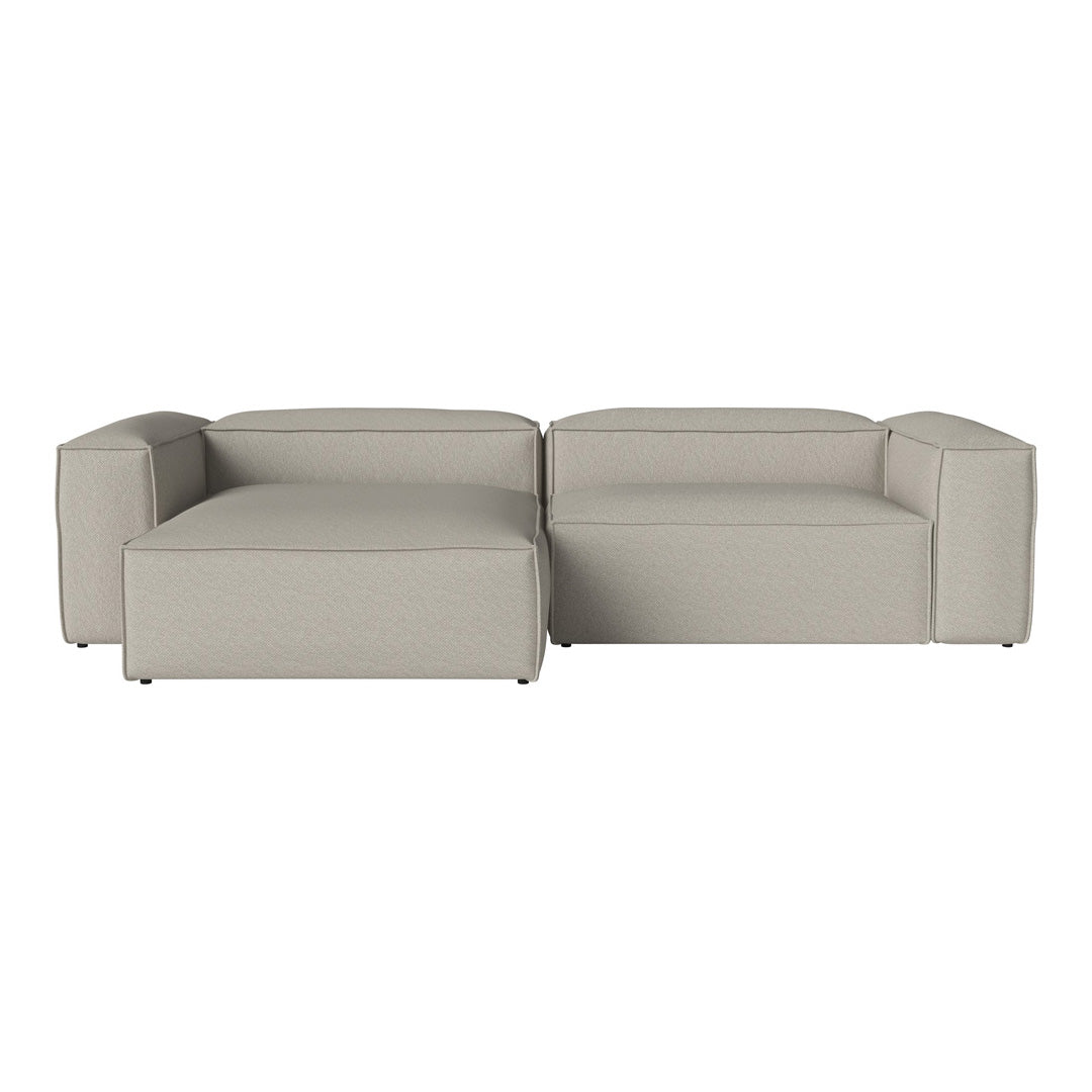 Modern two-tone gray sectional sofa with a minimalist design and smooth upholstery. Ideal for contemporary living rooms.