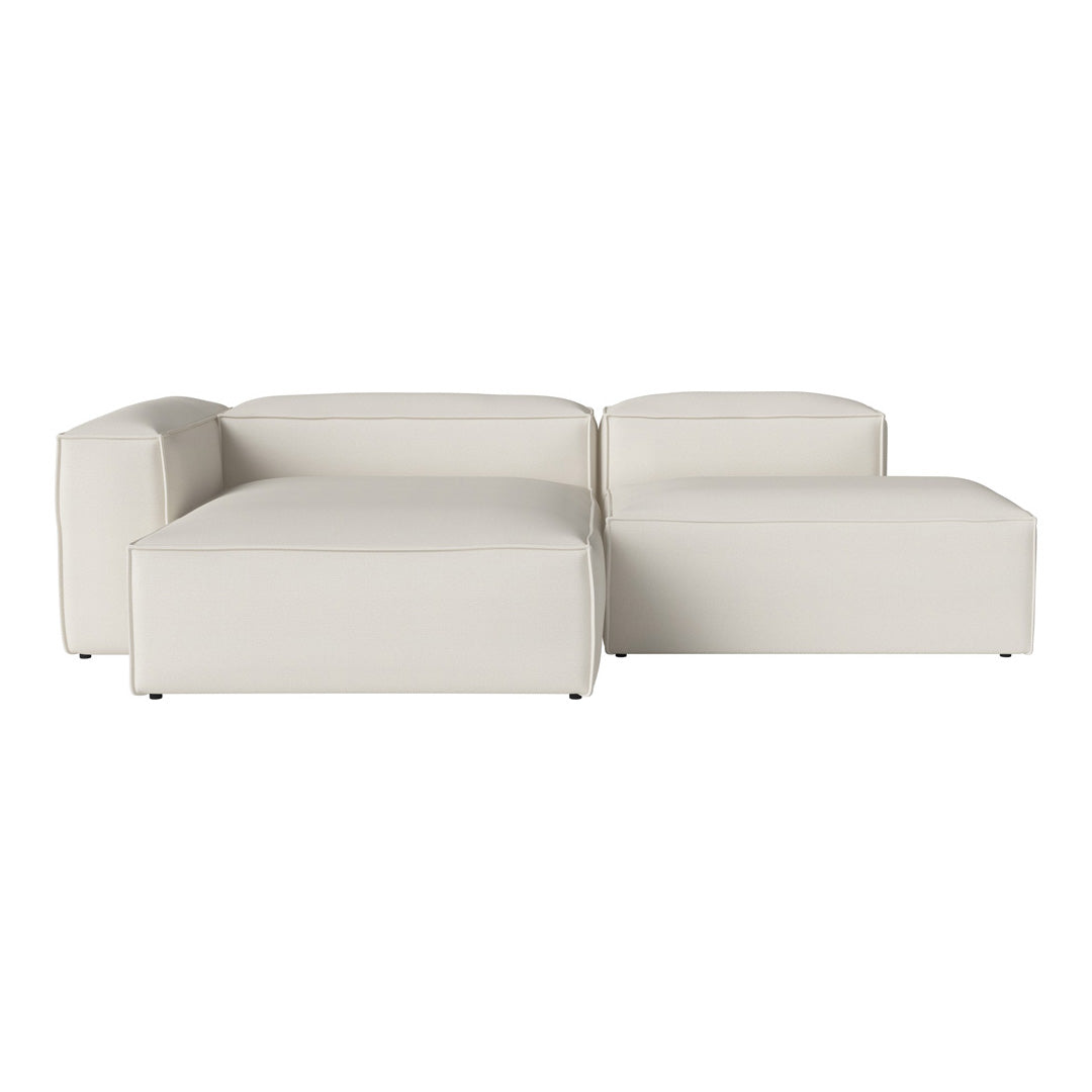 Modern white sectional sofa with sleek, minimalist design and smooth surface. Perfect for contemporary living spaces.