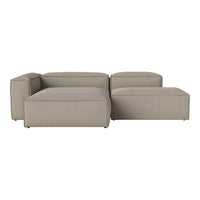 Beige modular sofa with a smooth, textured fabric and clean, modern lines, perfect for contemporary decor.