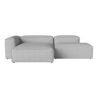 Modern gray sectional sofa with a minimalist design and textured fabric. Perfect for contemporary living spaces.