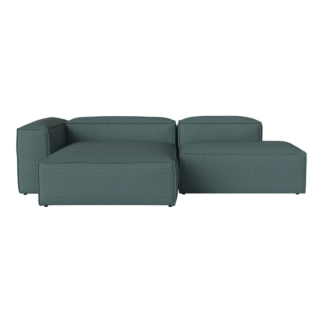 Teal modular sofa with a textured fabric and clean, contemporary design, perfect for modern living spaces.
