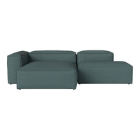 Teal modular sofa with a textured fabric and clean, contemporary design, perfect for modern living spaces.