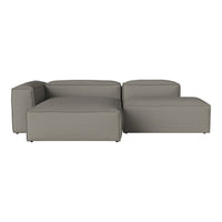 Gray modular sofa with a smooth, sleek fabric and contemporary design. Perfect for modern living spaces.