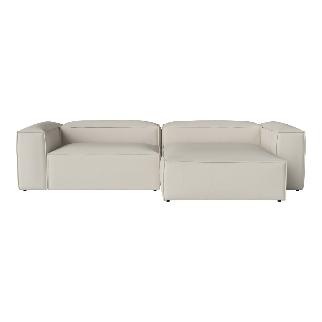 Modern light beige sofa with minimalist design, featuring smooth textures and clean lines. Perfect for contemporary decor.