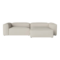 Modern light beige sofa with minimalist design, featuring smooth textures and clean lines. Perfect for contemporary decor.