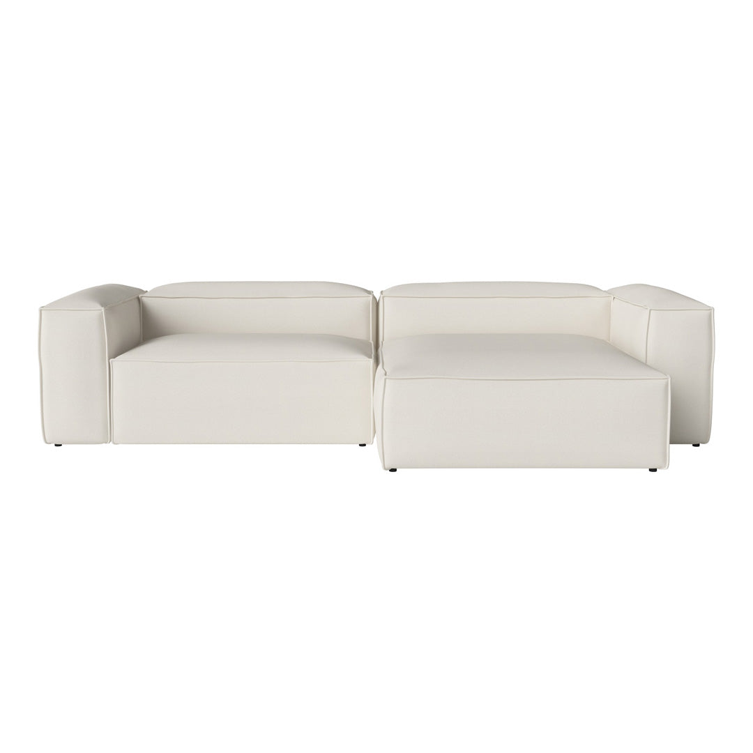 Modern white sectional sofa with smooth leather upholstery and structured geometric design. Perfect for contemporary decor.