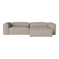 Light beige modular sofa with a smooth, minimalist design and clean lines. Ideal for modern living spaces.