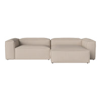 Beige modular sofa with a smooth, modern design and sleek lines, perfect for contemporary living spaces.