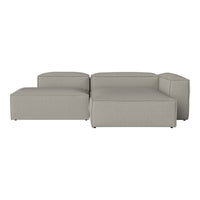 Sleek modular sofa in light gray fabric with smooth lines and contemporary design. Ideal for modern interiors.