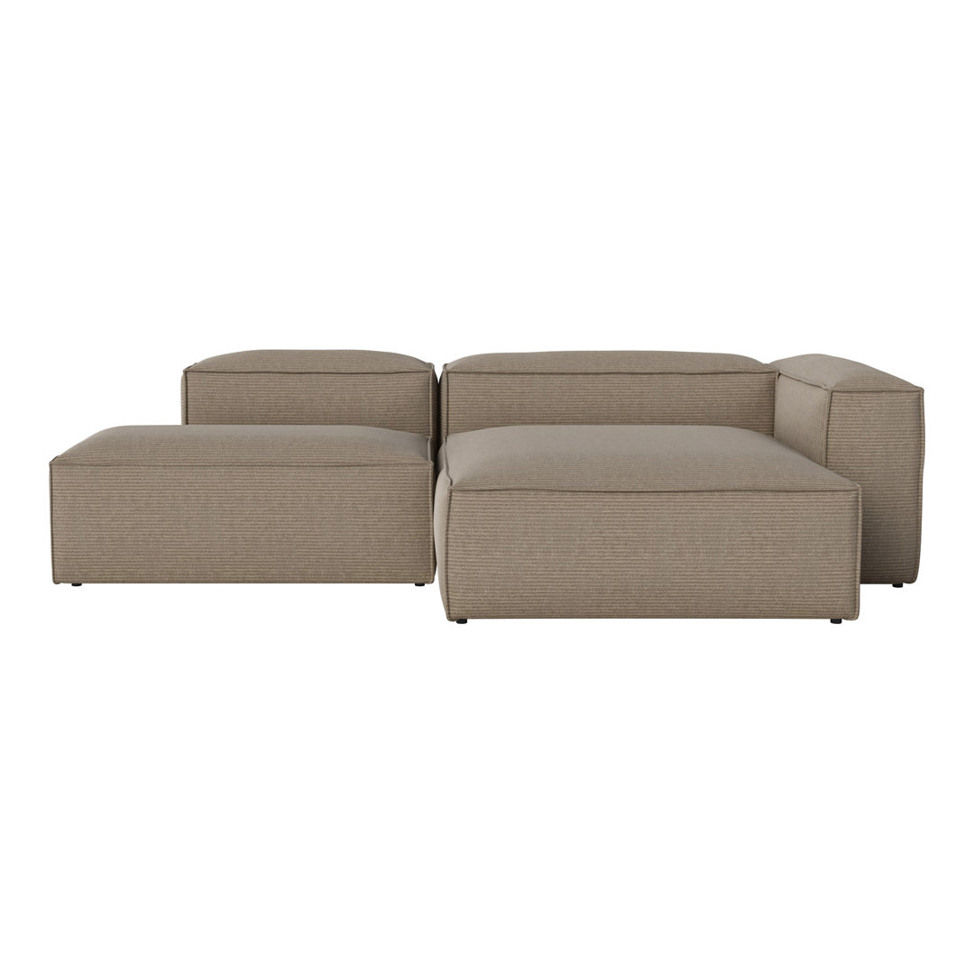 Tan modular sofa with a smooth, textured fabric, featuring clean lines and a modern aesthetic. Ideal for contemporary decor.