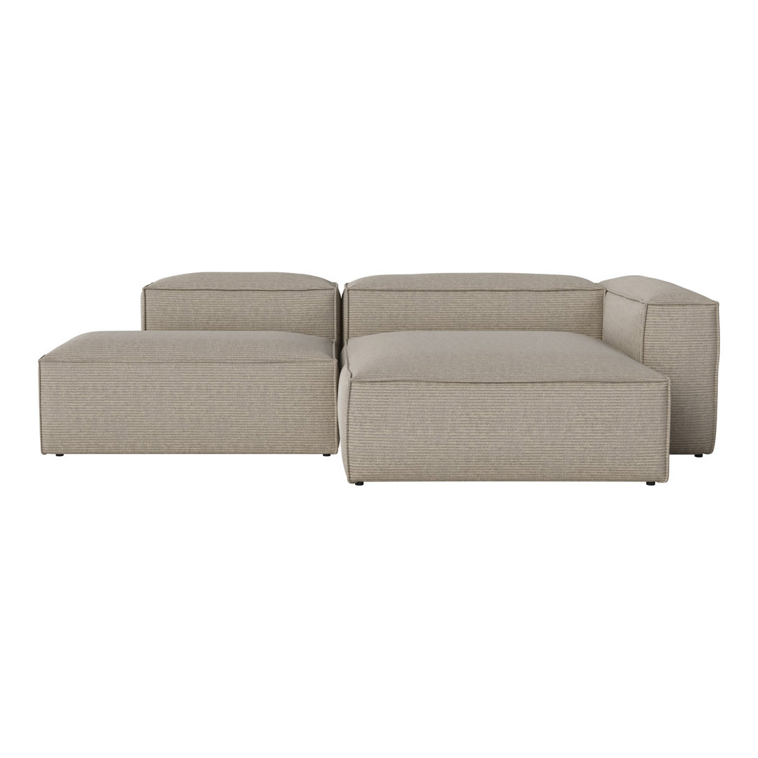 Beige modular sofa with a textured fabric pattern, featuring clean lines and a contemporary design.