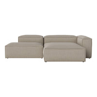 Beige modular sofa with a textured fabric pattern, featuring clean lines and a contemporary design.