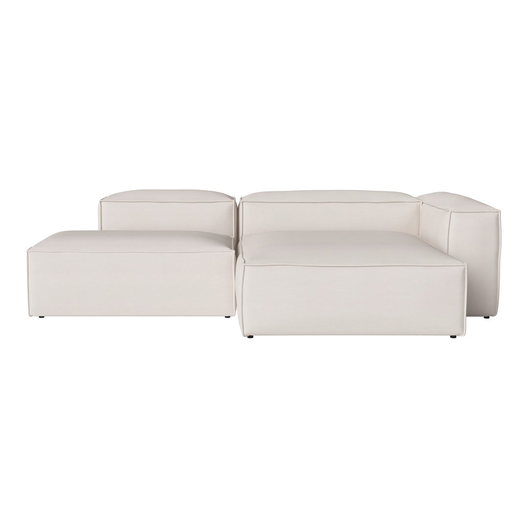Modern white modular couch with sleek lines and minimalistic design, perfect for contemporary spaces.