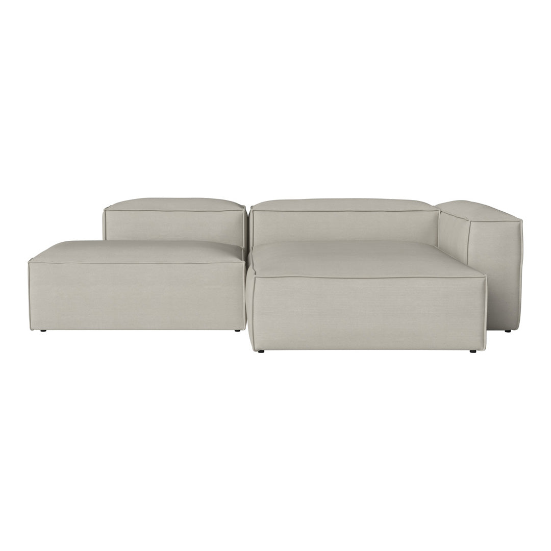 Soft light grey sectional sofa with clean lines and a minimalist, textured pattern. Ideal for modern living spaces.