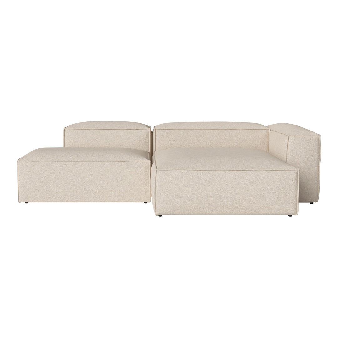 Beige modular sofa with a textured pattern, featuring smooth, modern lines and a minimalist design.