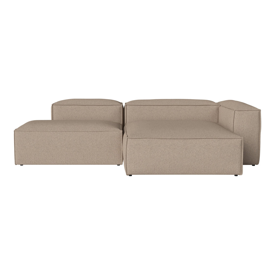 Tan modular sofa with a smooth, contemporary design and subtle texture, perfect for modern living spaces.