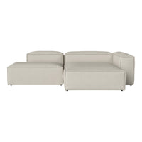 Soft beige modular sofa with smooth texture and minimalist design, perfect for modern living spaces.