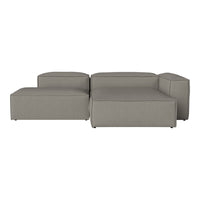 Gray modular sofa with a sleek, minimalist design and textured fabric. Perfect for modern living spaces.
