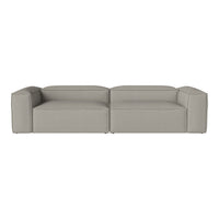 Gray sectional sofa with a simple, modern design and smooth, textured fabric. Perfect for contemporary living spaces.