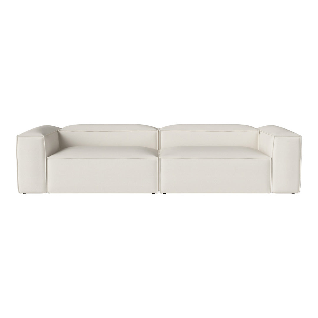 Sleek modern white sofa with a minimalist design and smooth, clean lines. Perfect for contemporary living spaces.