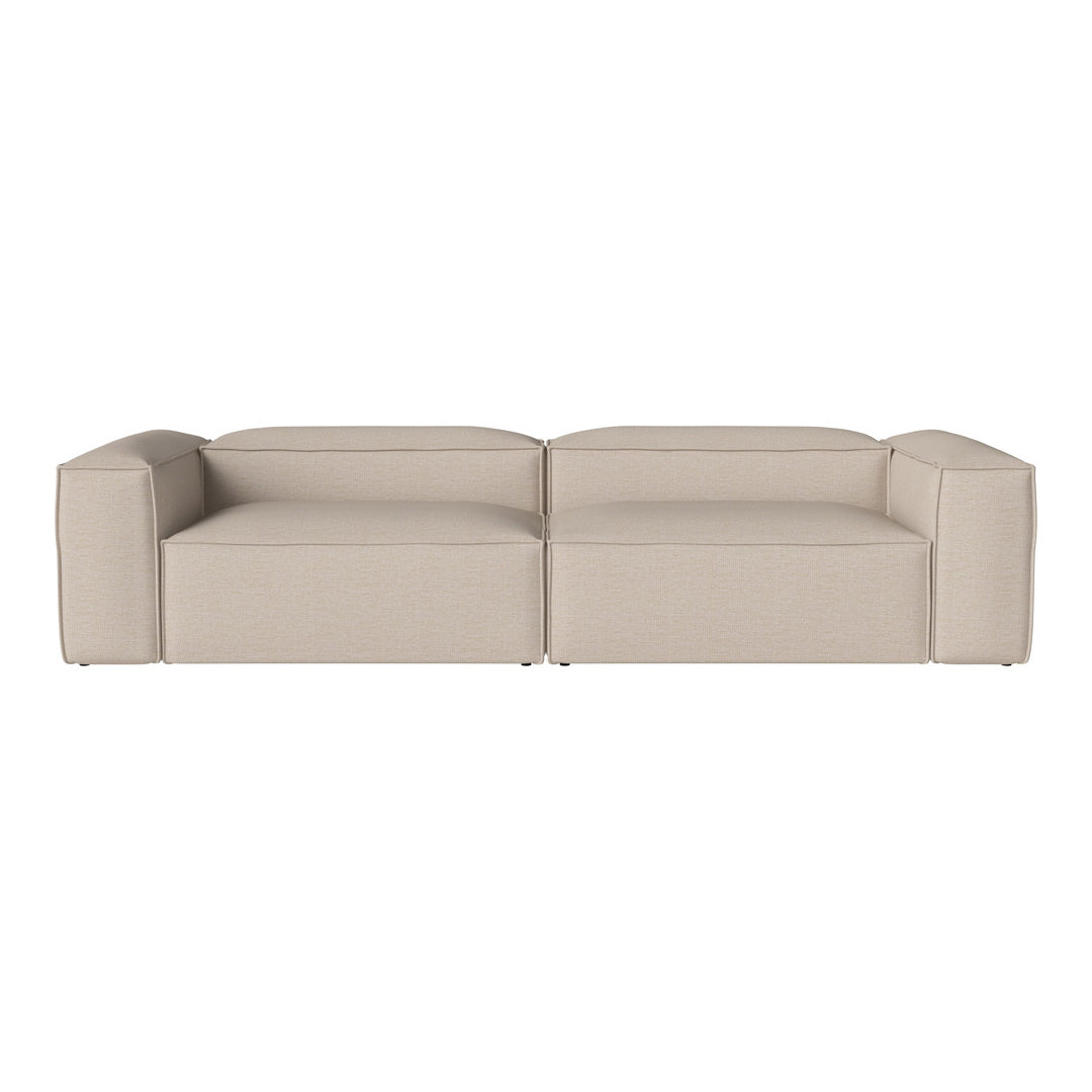 Stylish beige sectional sofa with a sleek, minimalist design and clean lines, perfect for modern decor.