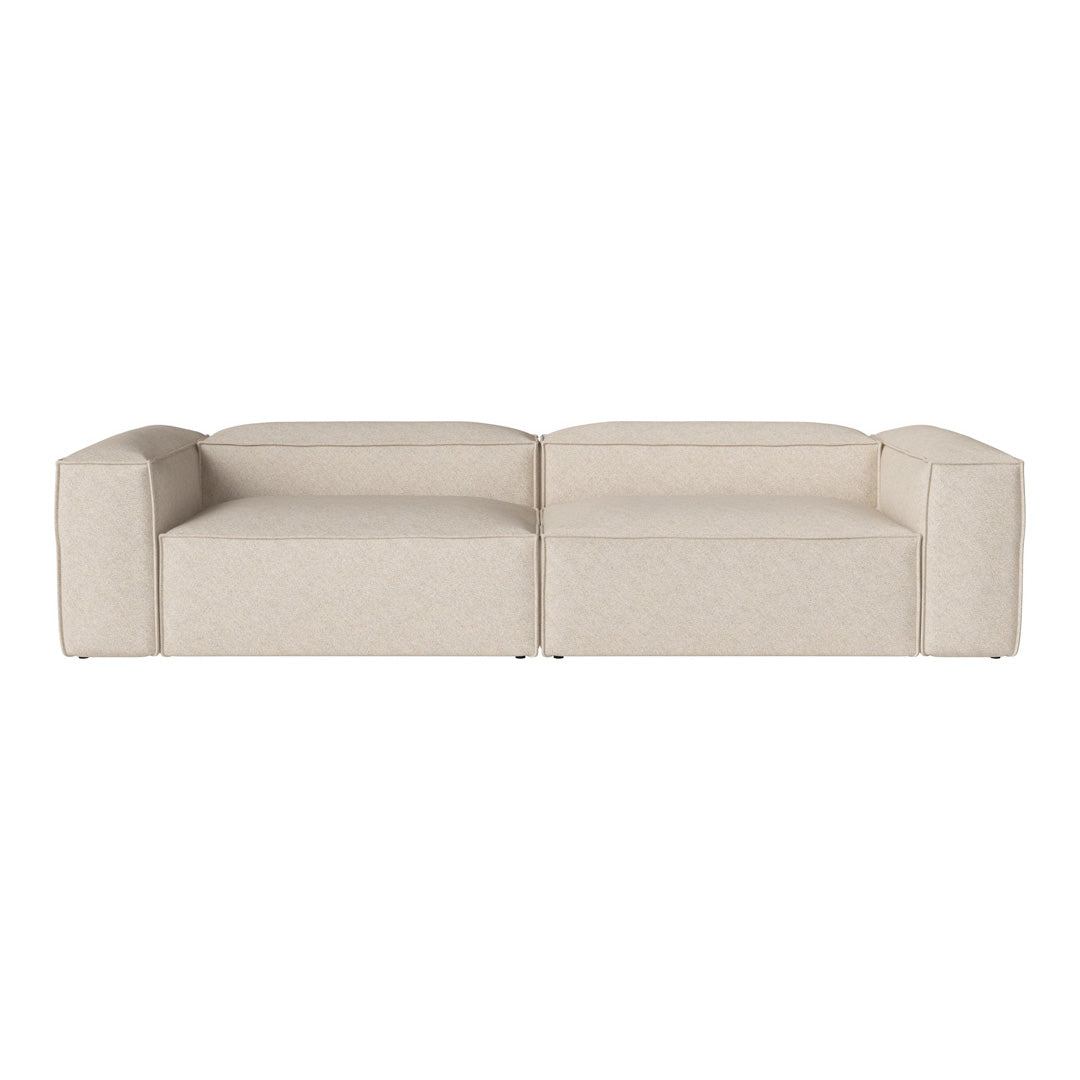 Beige sectional sofa with a contemporary design and smooth, textured fabric. Ideal for modern living rooms.