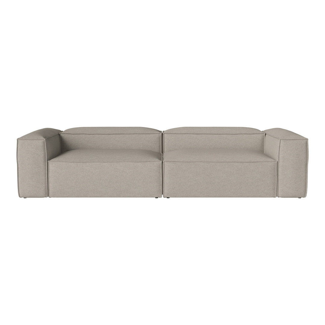 Light beige modular sofa with a minimalist design and smooth, textured fabric. Perfect for modern decor.