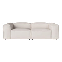Modern white sectional sofa with smooth, clean lines and a minimalist design. Perfect for contemporary decor.