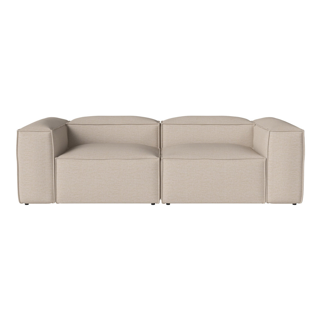 Beige modular sofa with a modern, minimalist design and clean lines, perfect for contemporary living spaces.