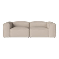 Beige modular sofa with a modern, minimalist design and clean lines, perfect for contemporary living spaces.